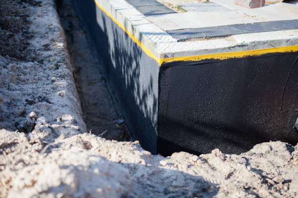 Professional Emergency Waterproofing technician working in Middletown, IN